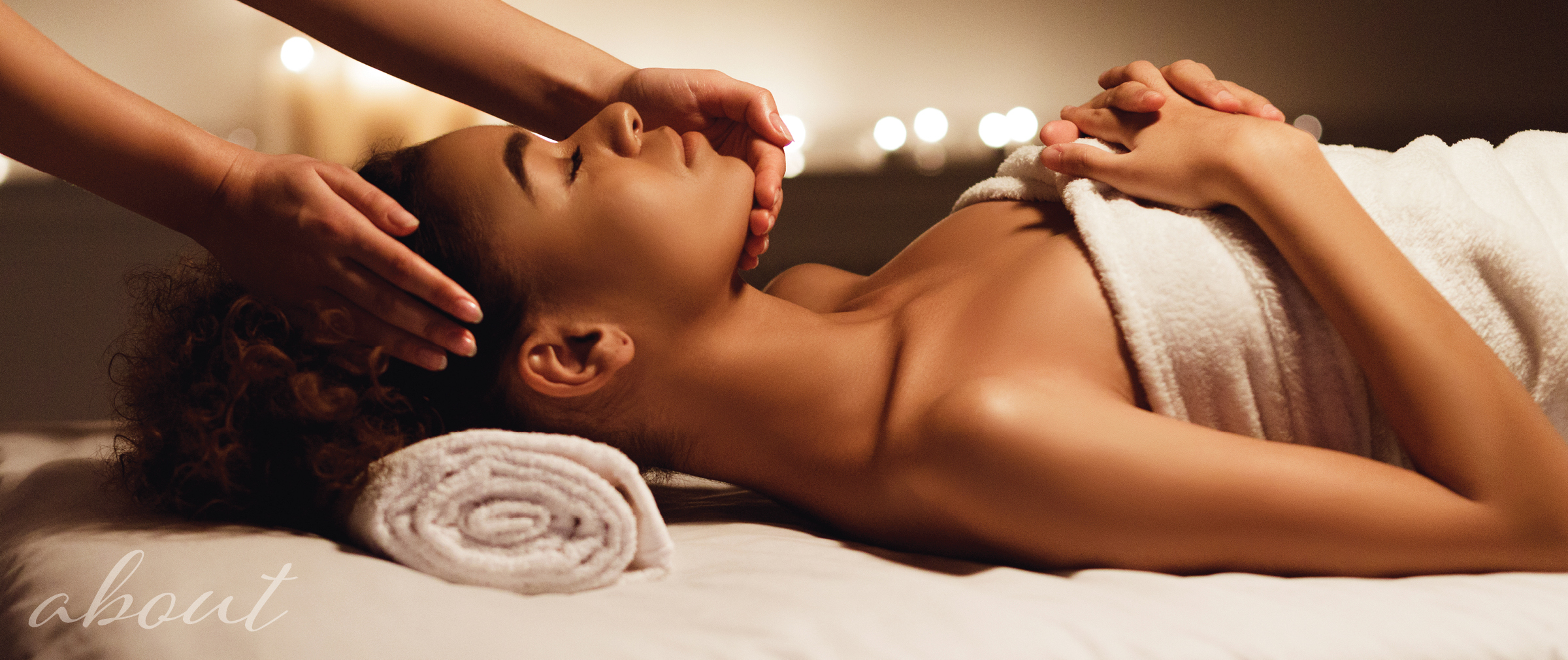 Women relaxing on back while receiving facial